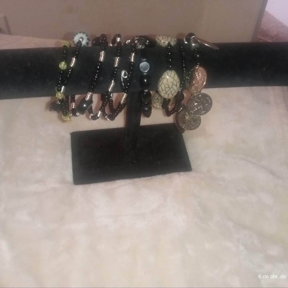 Black and Gold Charm Bracelet Collection